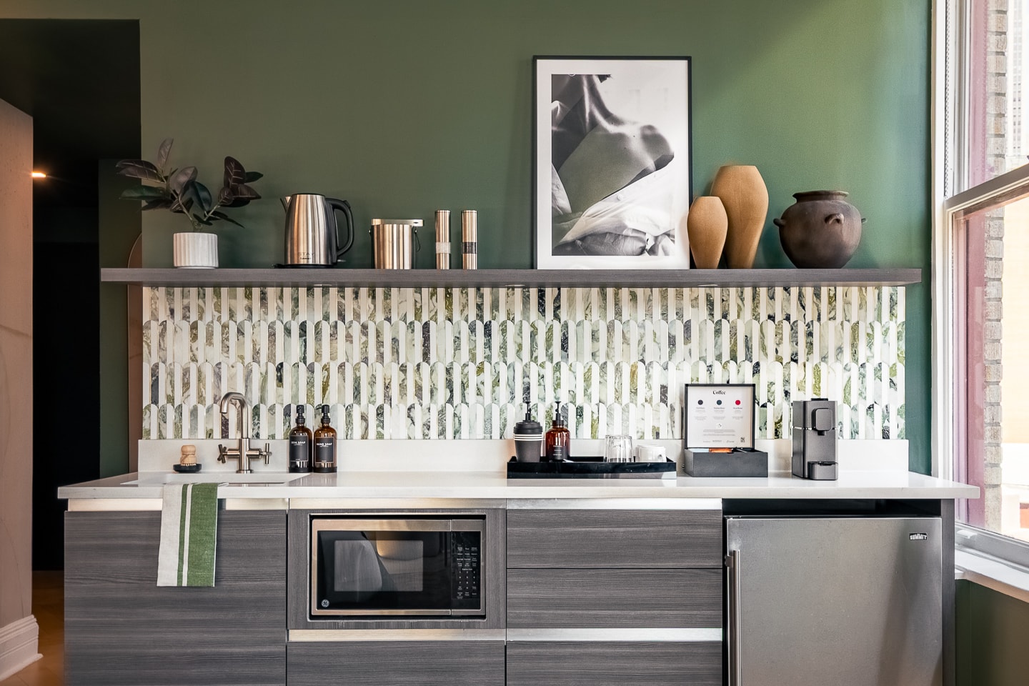 Room 1002, kitchenette behind the mosaic tile