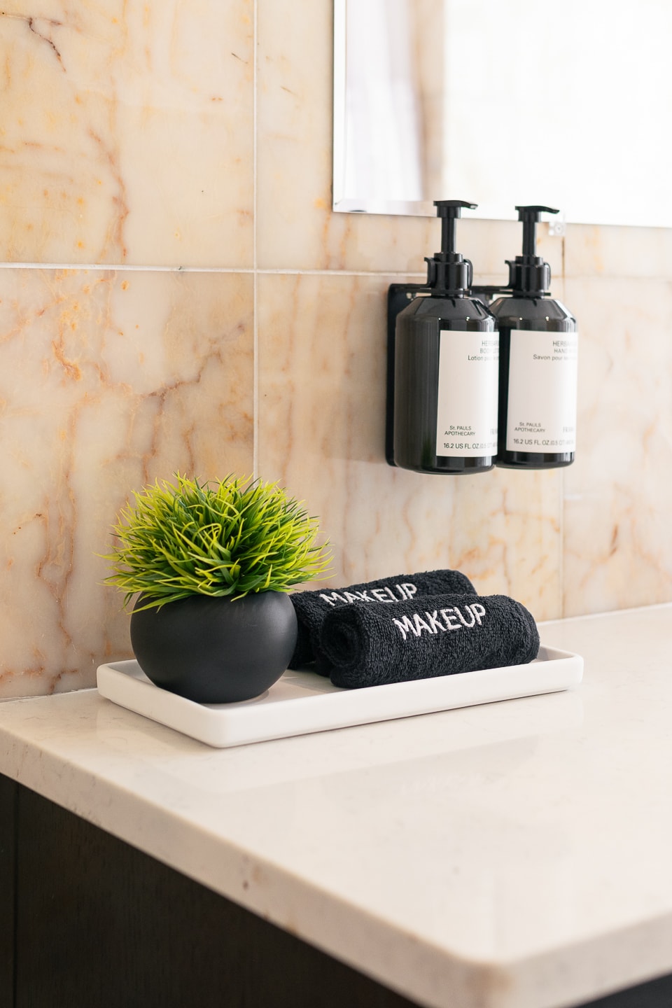 A bathroom counter detail in a Return Policy residence